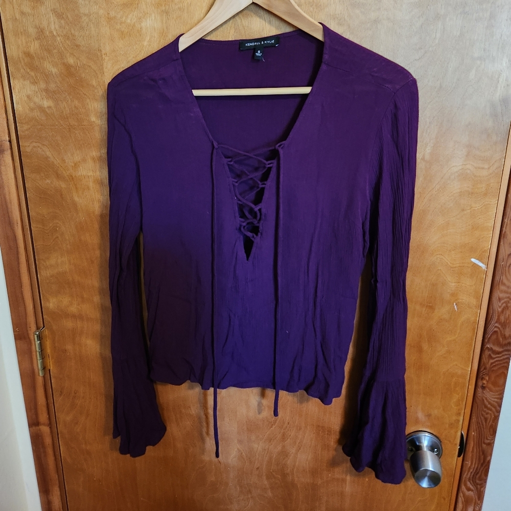 Purple lace-up v-neck top